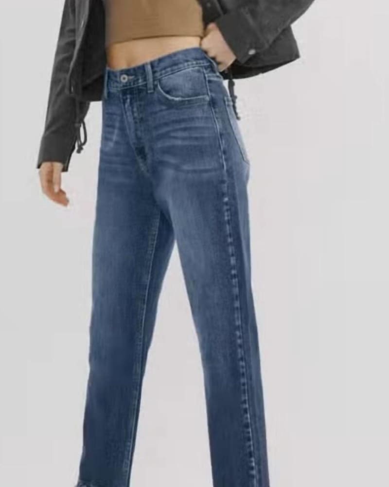 Front of a model wearing a size 45197 High Rise Relax Tapered Fit Jeans in Blue in Blue by KanCan. | dia_product_style_image_id:326119
